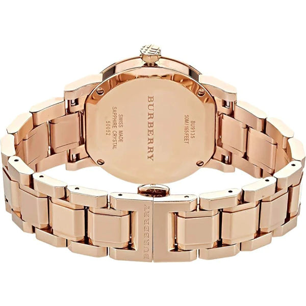 A backside view Burberry Check Gold Stainless Steel White Dial Quartz Watch for Ladies  with  white background