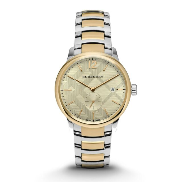 A Closeup Front View Burberry Classic Two-tone Stainless Steel Gold Dial Quartz Watch for Gents with White Background